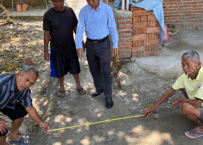 Pemdes Paningkiran Rampungkan Rehabilitasi Jalan Lingkungan