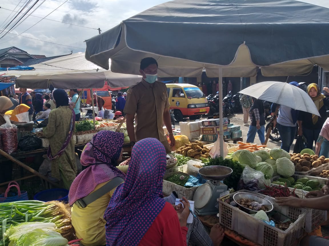 Sosialisasi Covid-19 di Pasar